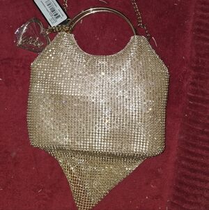 Bebe Sparkling Gold Mesh Wristlet